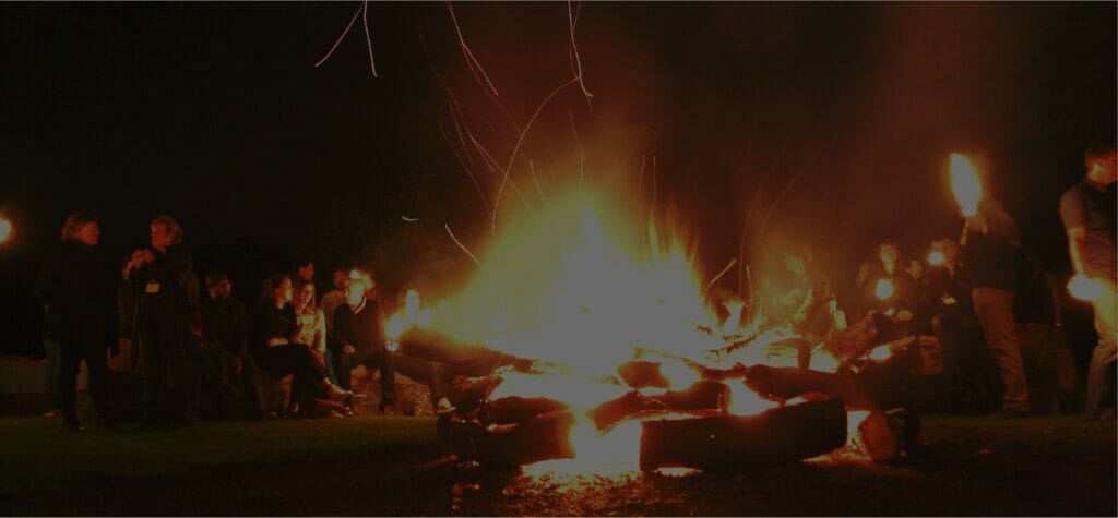 group of people round a fire