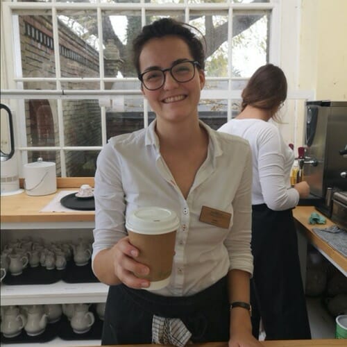 Girl serving coffee in the Orangery