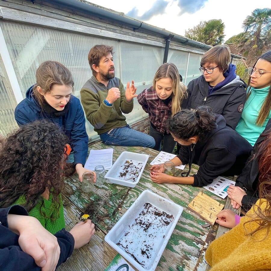 Group with Tm looking at the soil